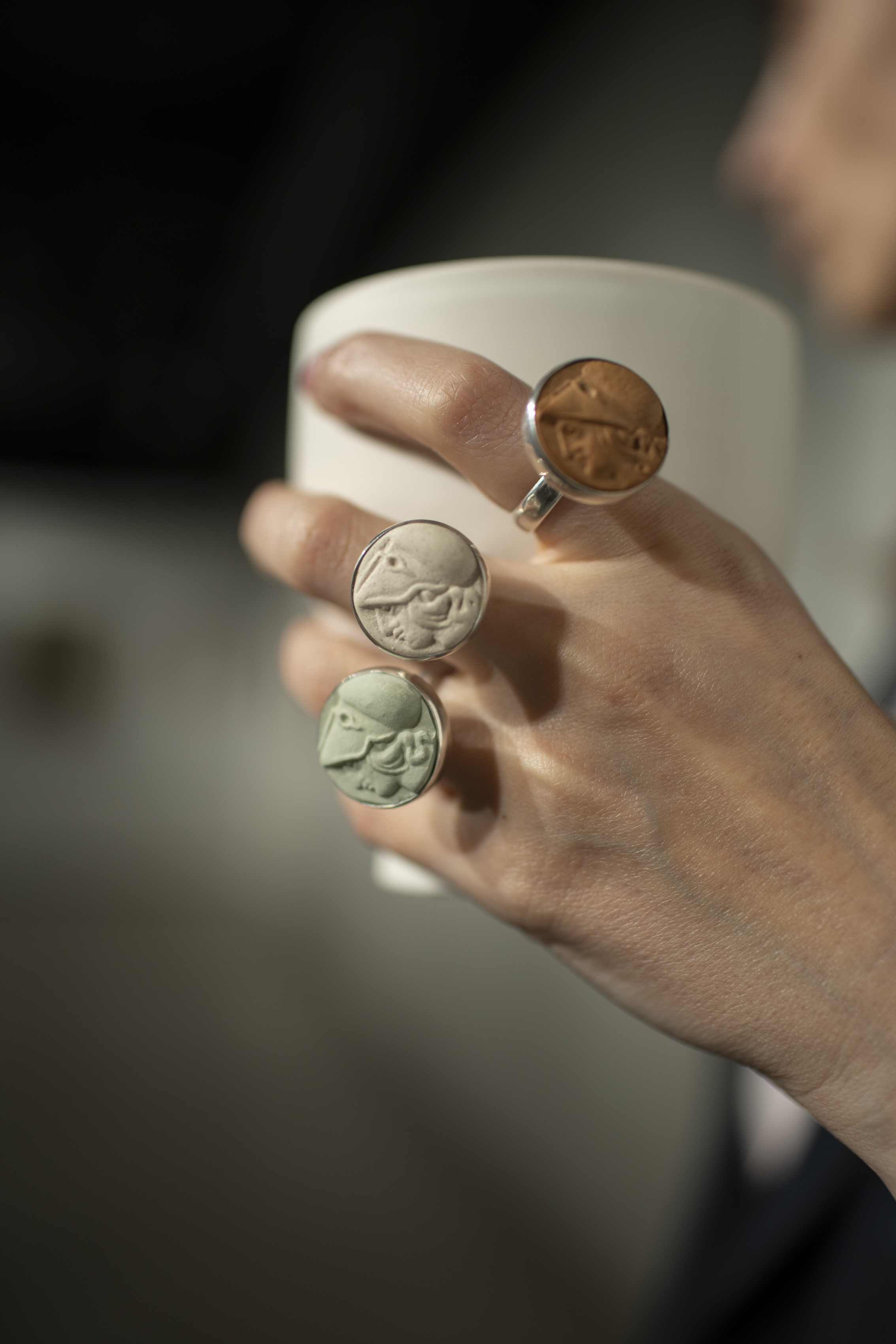 Sergo Kobuladze Signature Rings — quartz, porcelain and gold finishes — on mineral display blocks, The Art Concept Gallery, Art Foundation Anagi, Tbilisi, 2025. Photo: Giorgi Shengelia.