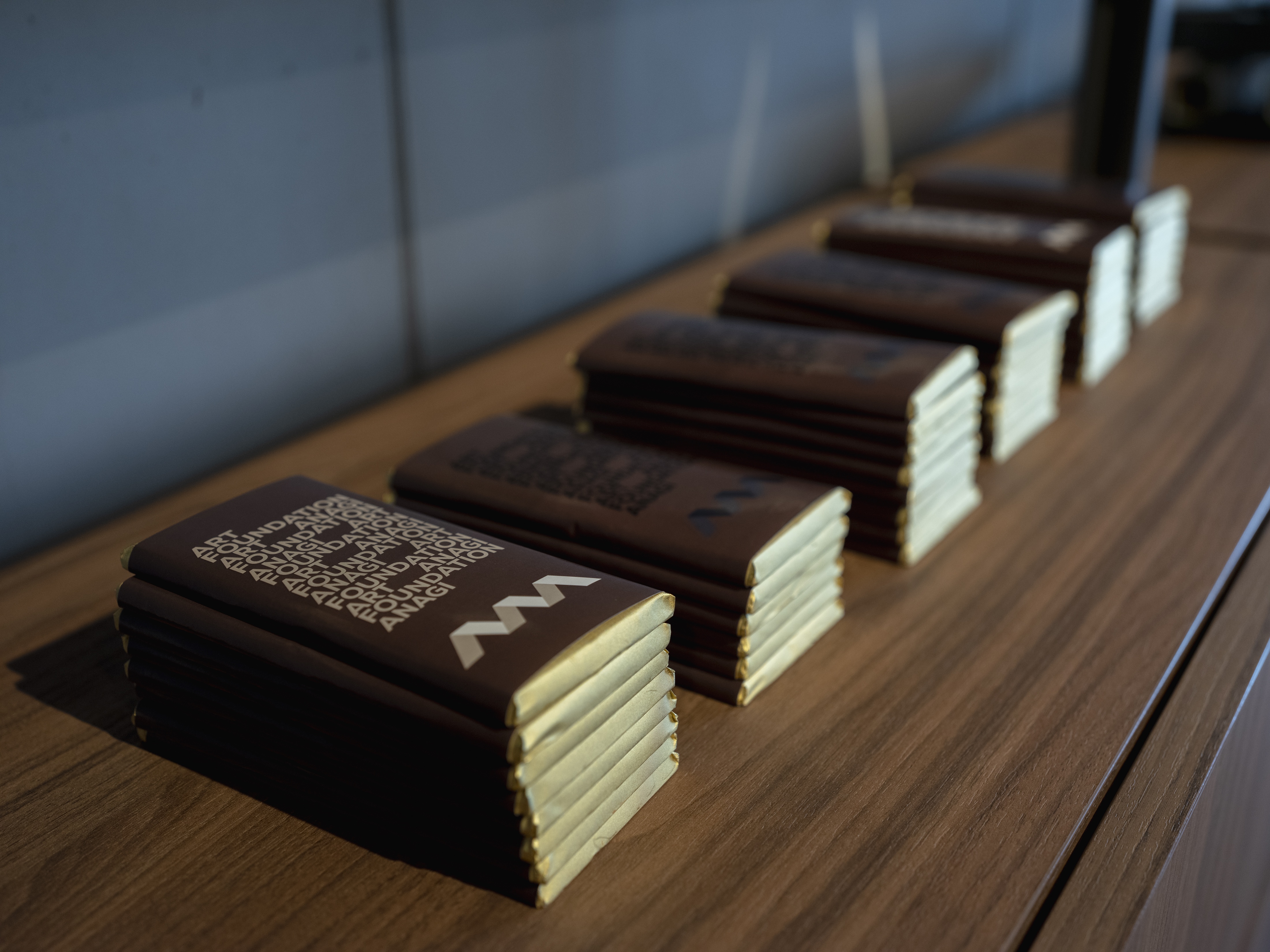 Stacks of AFA 70 % dark chocolate bars, The Art Concept Gallery, Art Foundation Anagi, Tbilisi, 2025. Photo: Giorgi Shengelia.